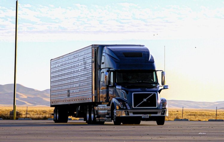 Semi-truck on highway for inland trucking and domestic freight